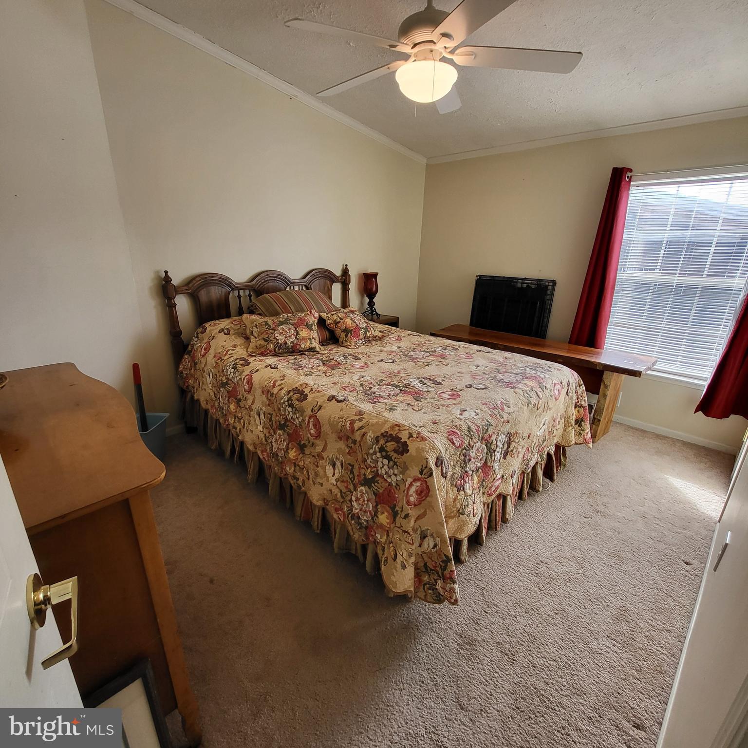 21571 Path Valley Road Dry Run, PA 17220 - Photo 33 of 63 a bedroom with bed and a chandelier