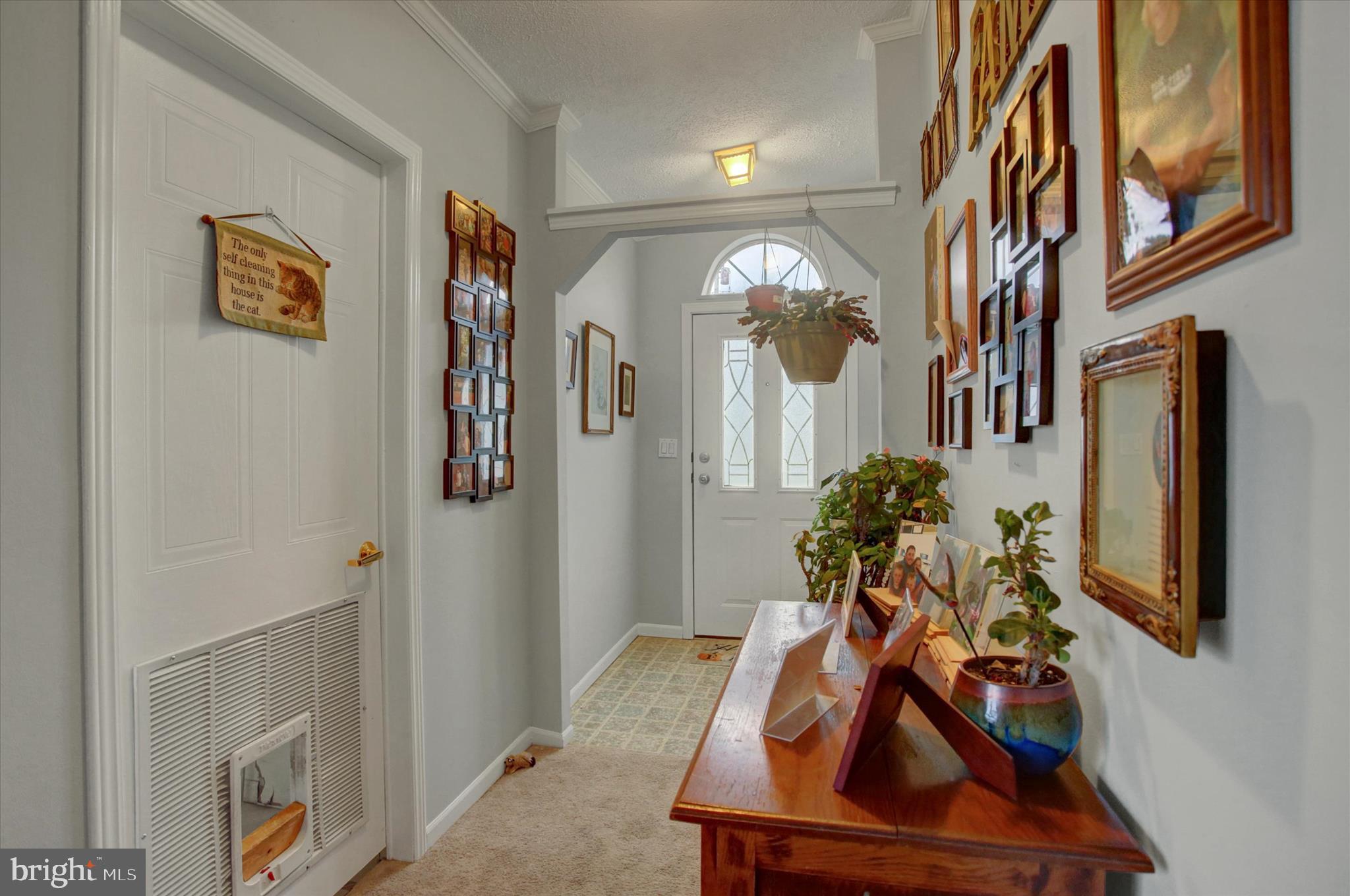 21571 Path Valley Road Dry Run, PA 17220 - Photo 4 of 63 a room with wooden floor and potted plant