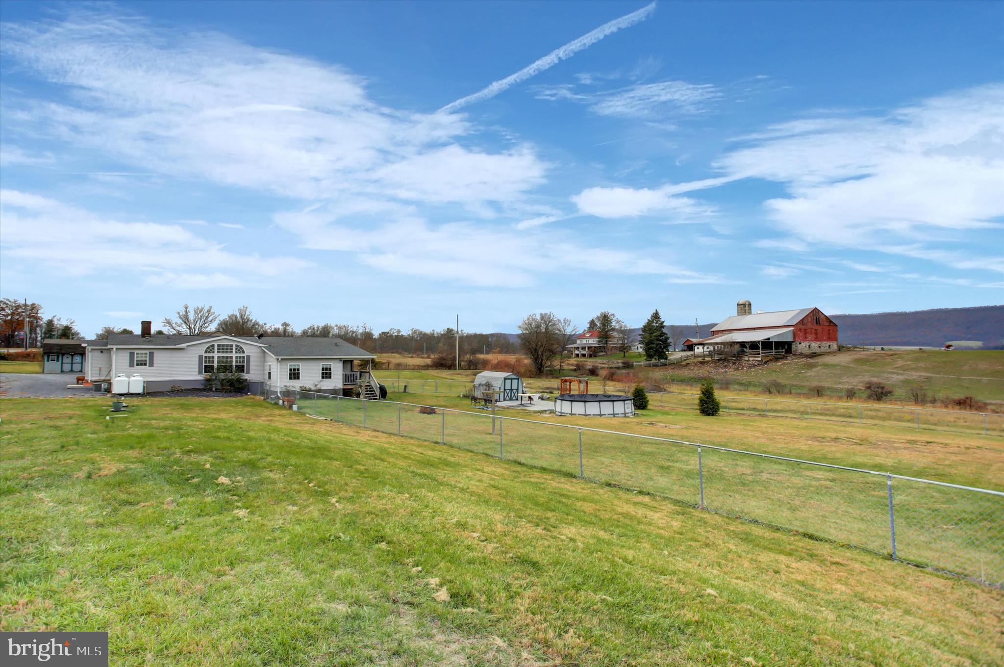 21571 Path Valley Road Dry Run, PA 17220 - Photo 51 of 63 Partially fenced in yard to keep your stock safe!