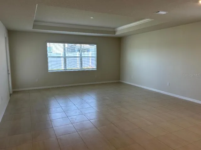 en empty room with windows