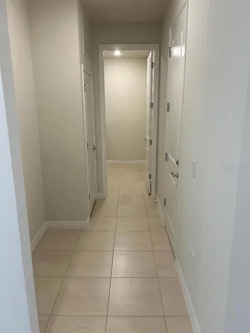 a bathroom with a shower and a sink