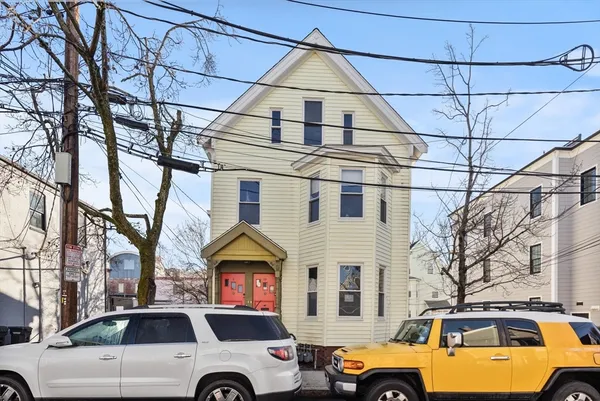 a view of a car parked on the road