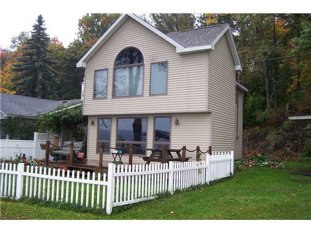 4056 Squaw Point Road, Unit SENECA Starkey, NY 14837 - Photo 1 of 1 Exterior Front 50 feet level frontage with lakesid