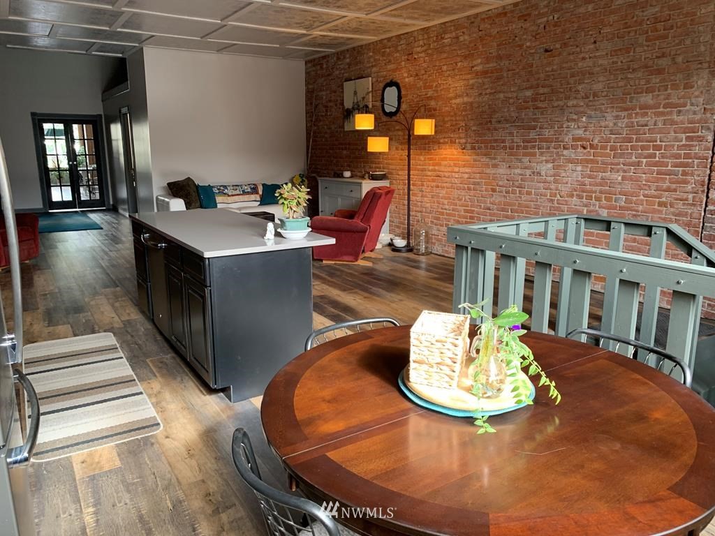358 East Main Street Dayton, WA 99328 - Photo 17 of 34 a living room with furniture and wooden floor