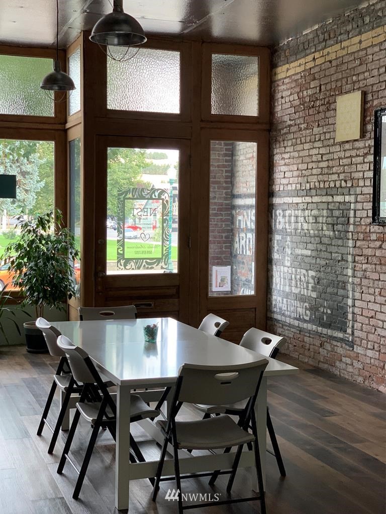 358 East Main Street Dayton, WA 99328 - Photo 19 of 34 a view of a dining room with furniture window and wooden floor