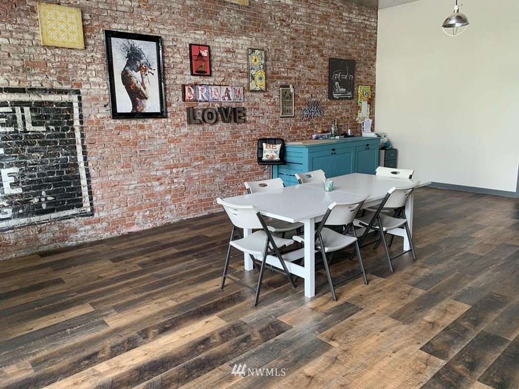 358 East Main Street Dayton, WA 99328 - Photo 22 of 34 a view of a patio with table and chairs and potted plants