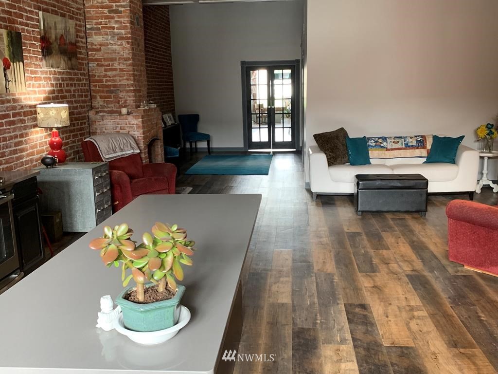 358 East Main Street Dayton, WA 99328 - Photo 8 of 34 a living room with furniture and a fireplace