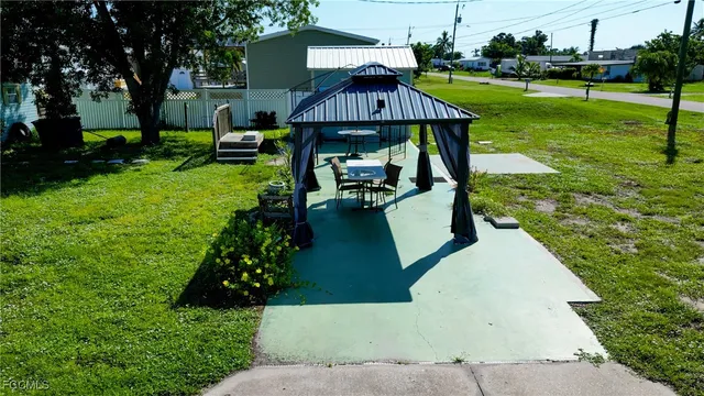 a view of a garden with swimming pool