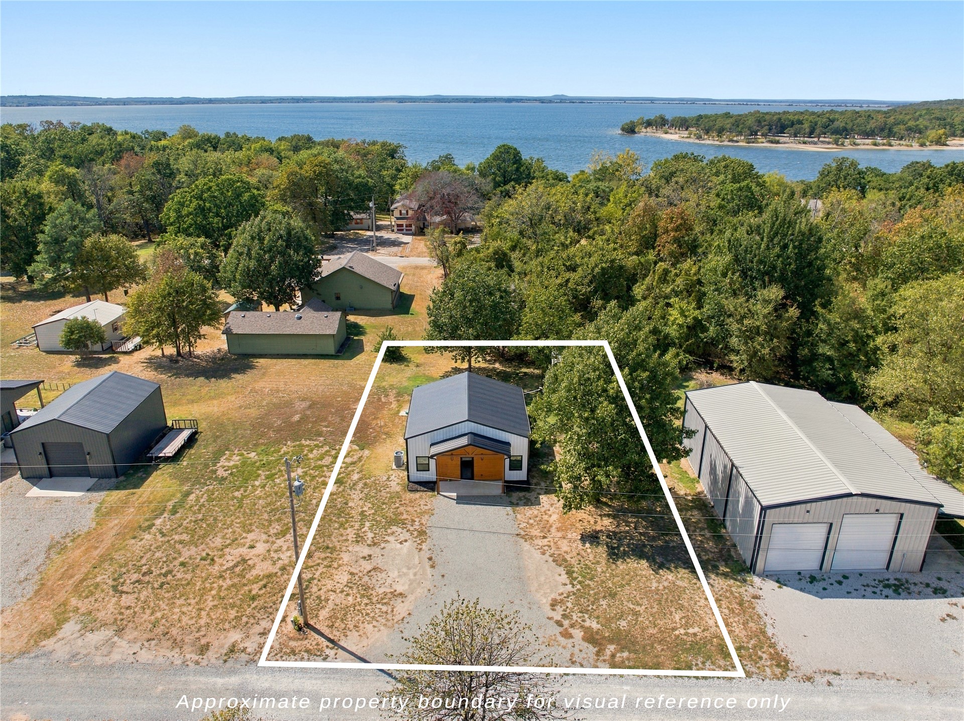 420942 East 1168 Road Eufaula, OK 74432 - Photo 40 of 43 Single-story home with a light-toned exterior and dark roof