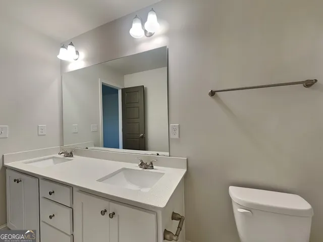 a bathroom with a sink and a toilet