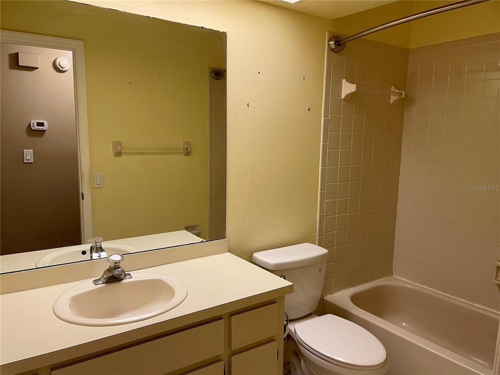 2564 Islander Court Palm Harbor, FL 34683 - Photo 17 of 21 a bathroom with a sink toilet and shower