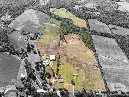 a view of a swimming pool with an outdoor seating