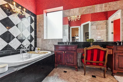 a bedroom with bed and window