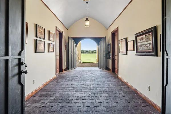 a view of a lake with couches and city view