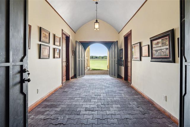 a view of a lake with couches and city view