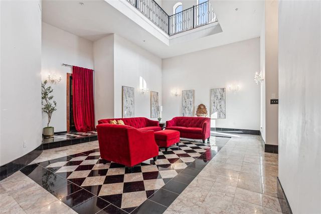 a kitchen with a cabinets a stove a sink and a microwave