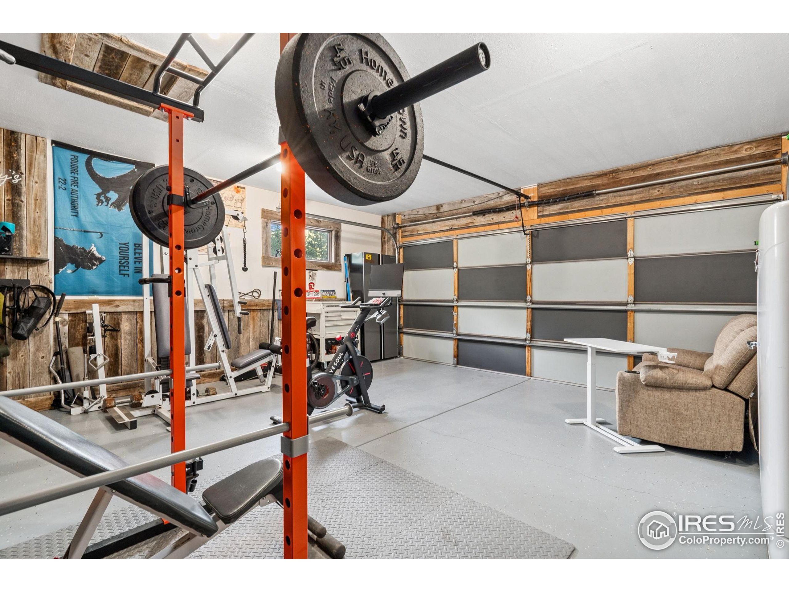 32224 Poudre Canyon Road Bellvue, CO 80512 - Photo 27 of 34 a view of a room with gym equipment