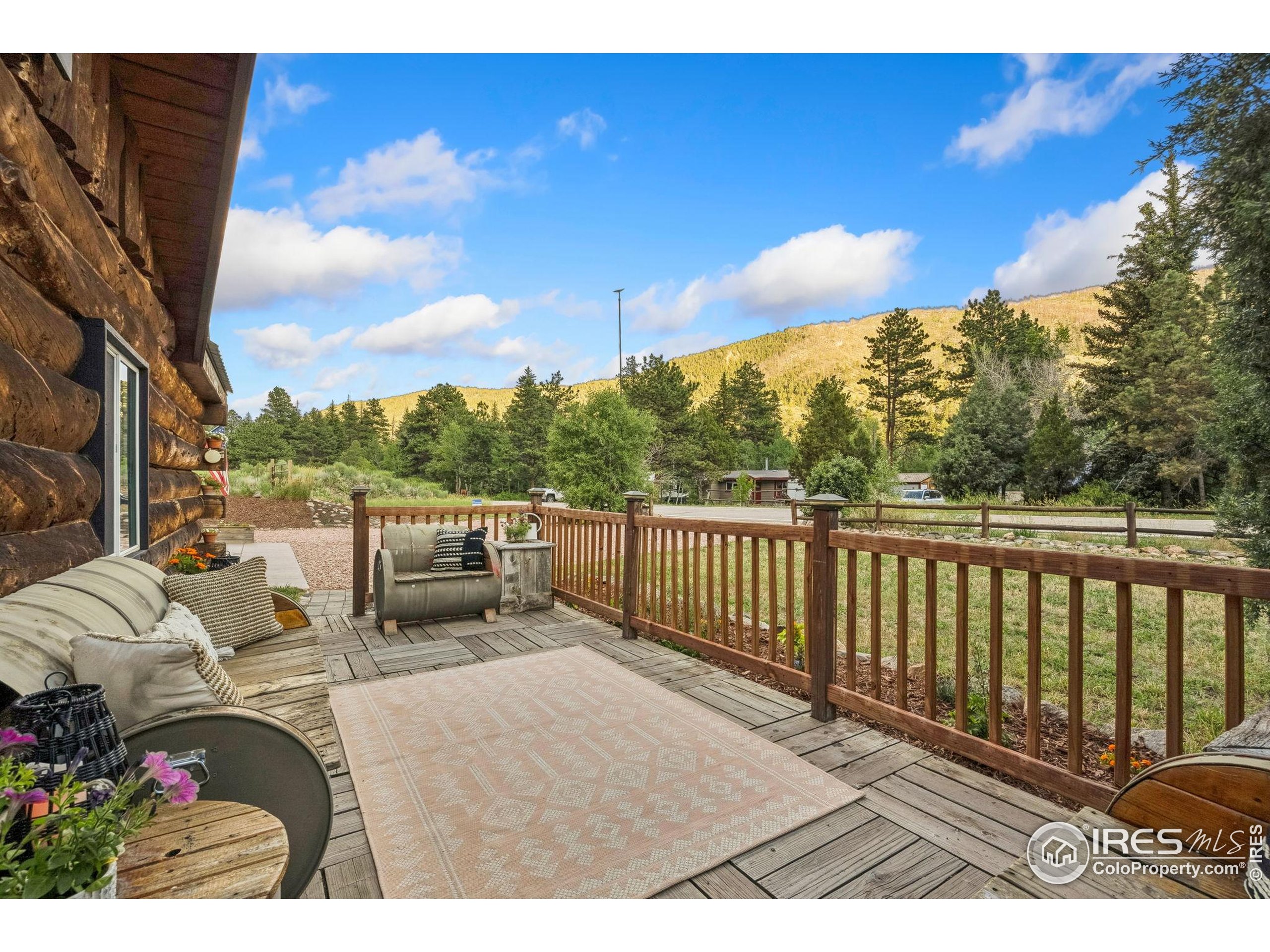 32224 Poudre Canyon Road Bellvue, CO 80512 - Photo 29 of 34 a view of balcony with furniture