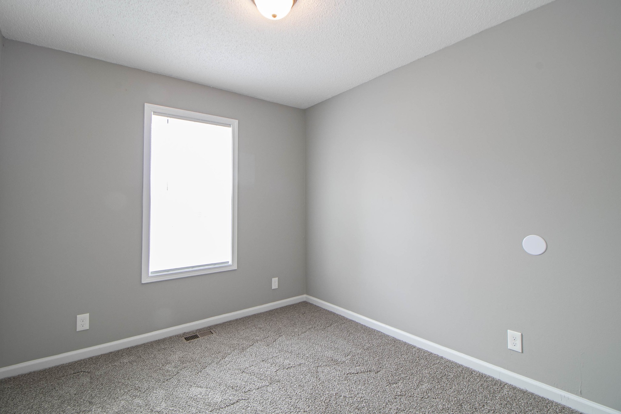 1913 Timberline Circle Oak Grove, KY 42262 - Photo 20 of 25 an empty room with a window