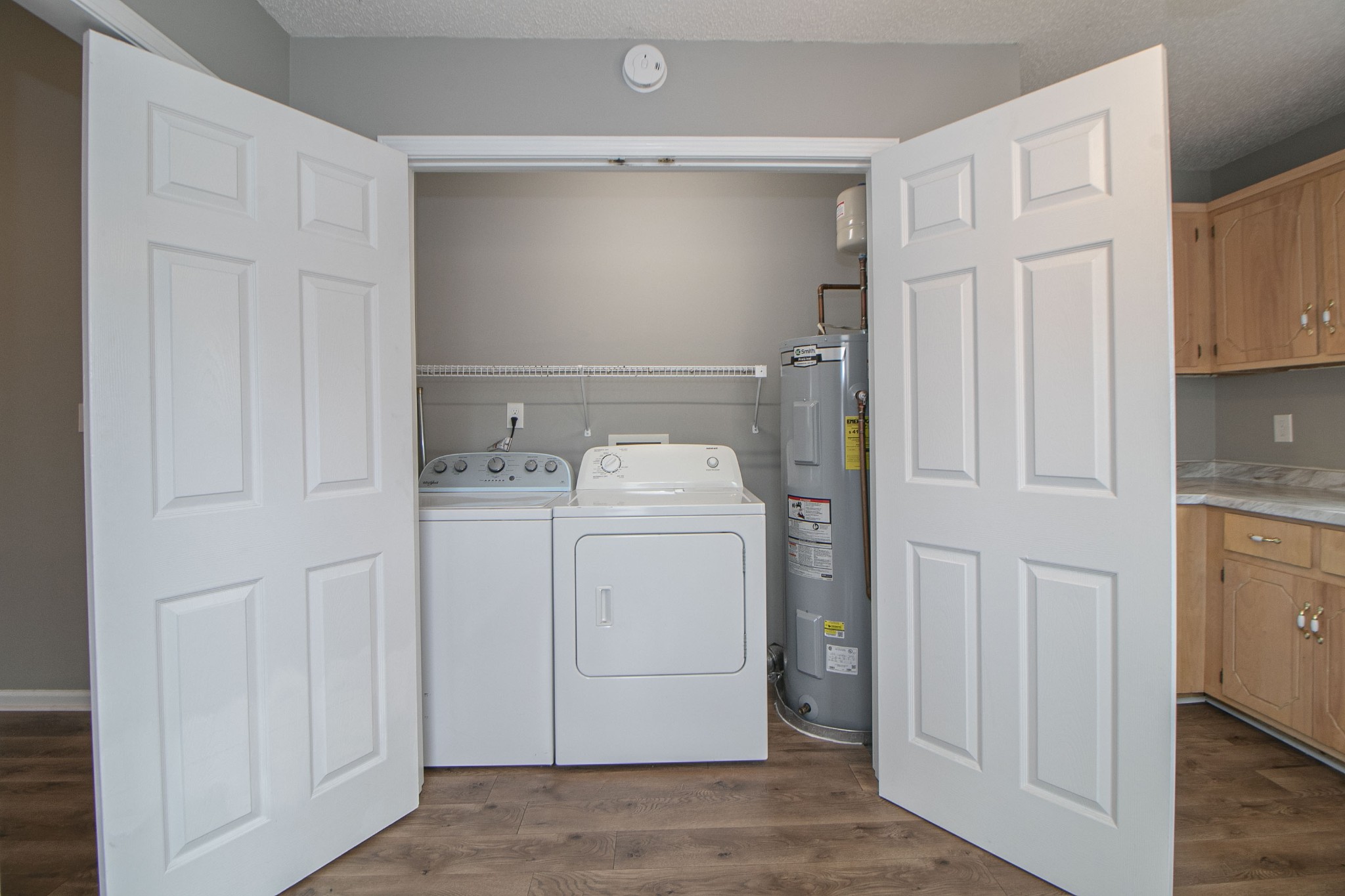 1913 Timberline Circle Oak Grove, KY 42262 - Photo 8 of 25 a utility room with cabinets washer and dryer