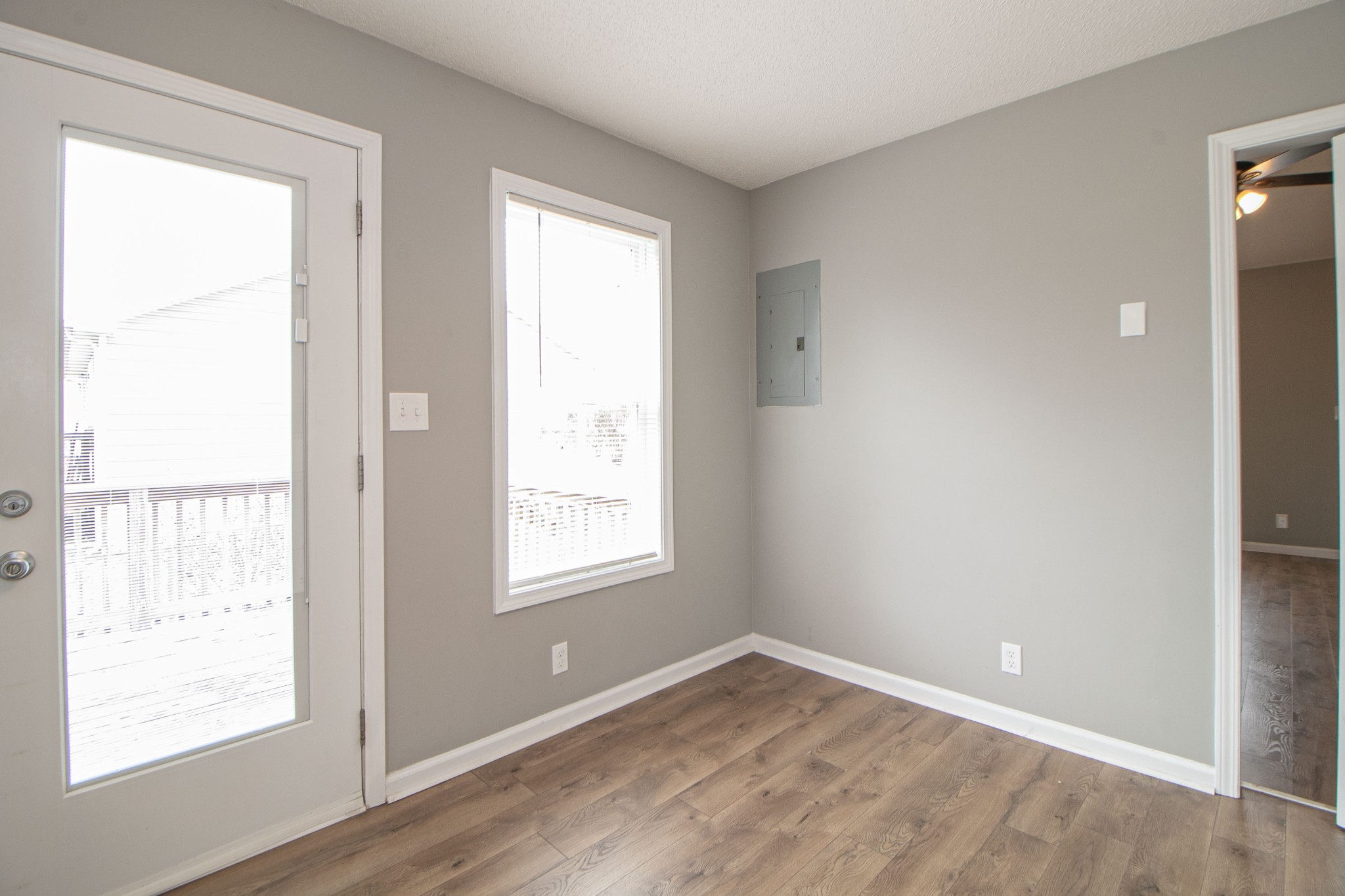 1913 Timberline Circle Oak Grove, KY 42262 - Photo 9 of 25 an empty room with wooden floor and windows