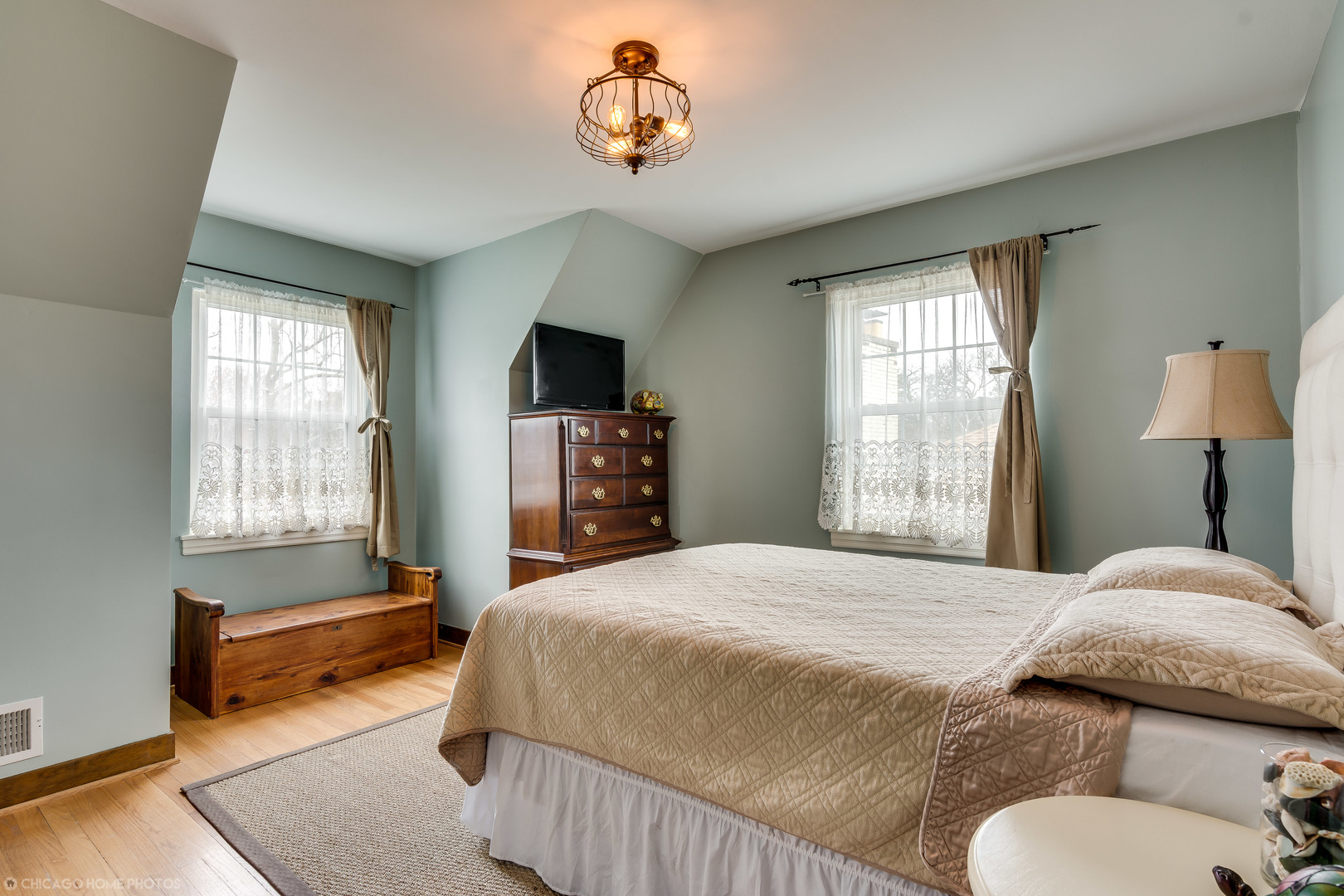 583 Selborne Road Riverside, IL 60546 - Photo 16 of 28 a bedroom with a bed and a window
