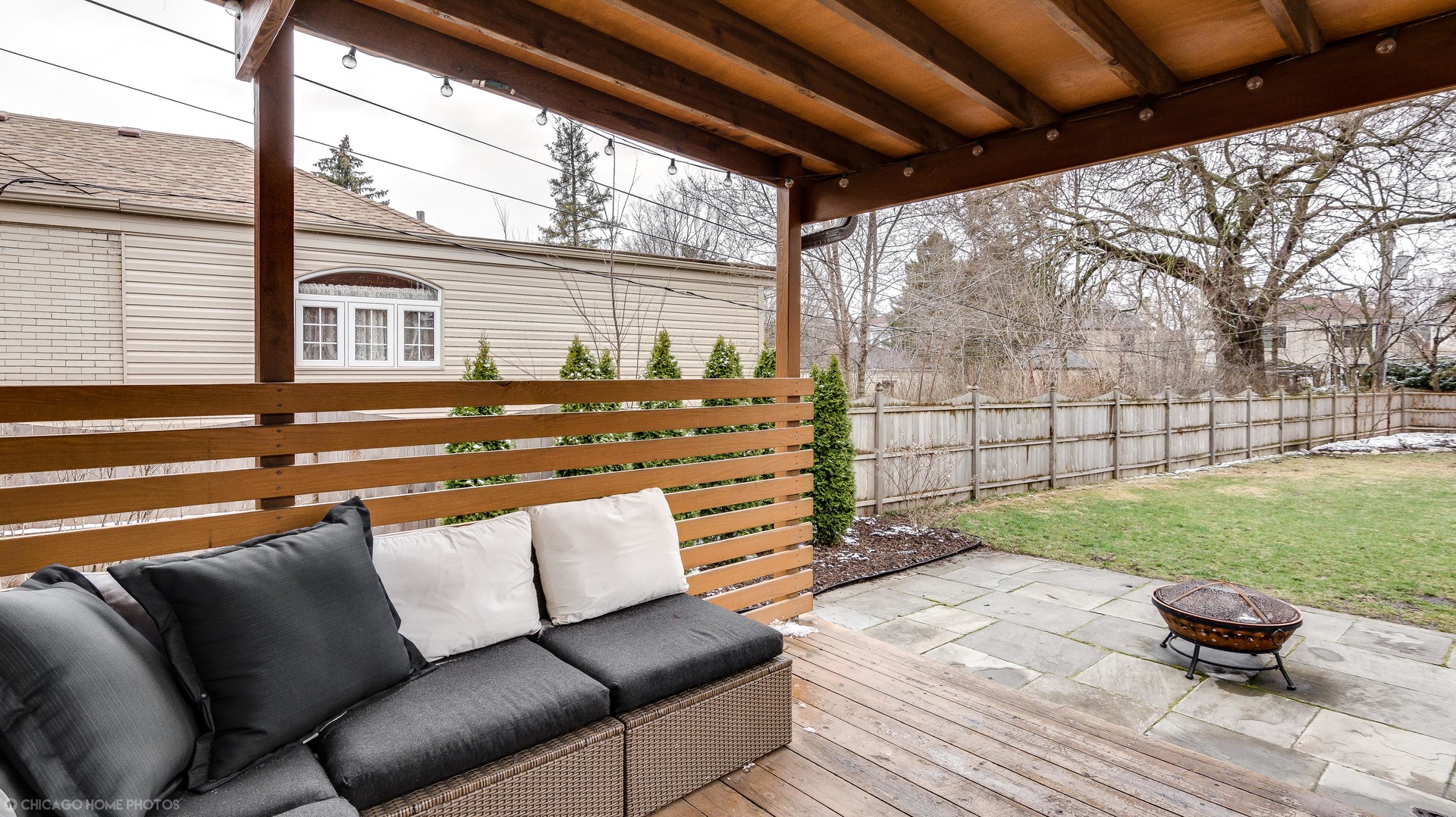 583 Selborne Road Riverside, IL 60546 - Photo 22 of 28 a roof deck with couch and chairs