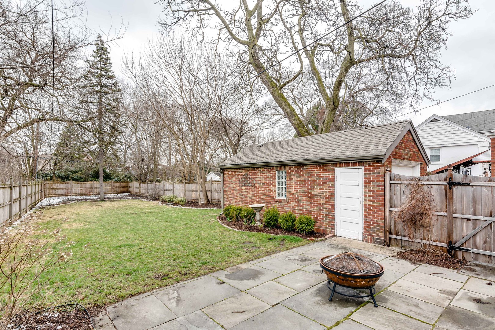 583 Selborne Road Riverside, IL 60546 - Photo 23 of 28 a view of a backyard with sitting area
