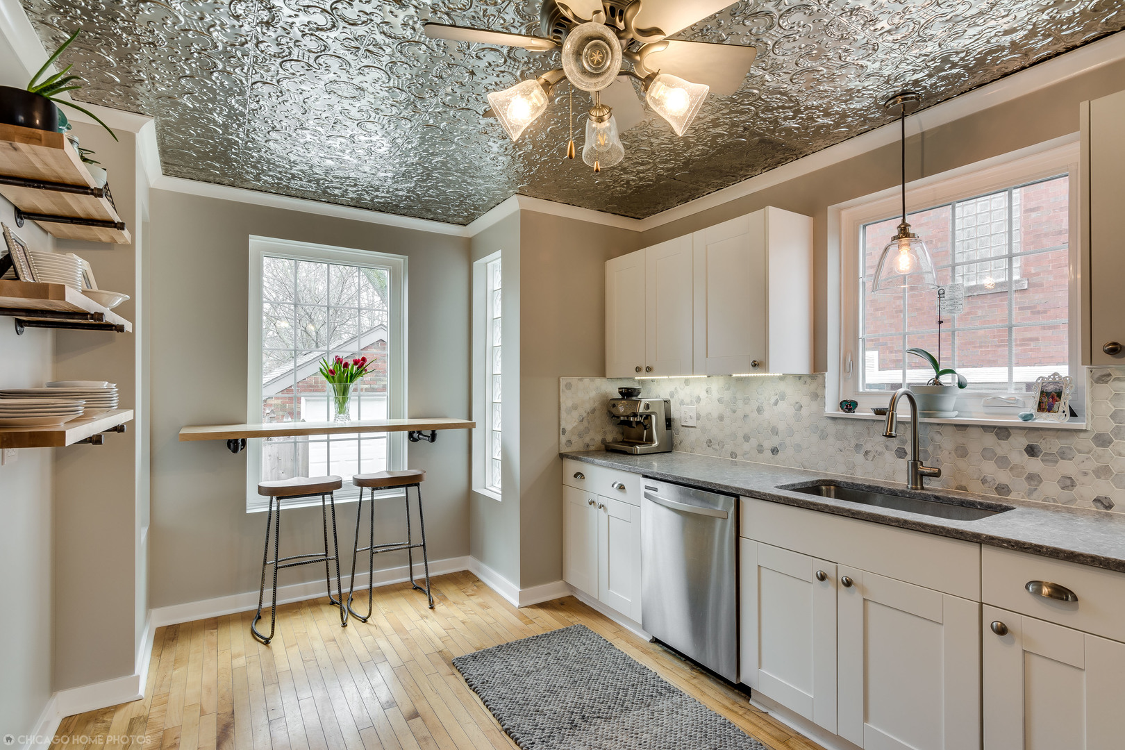 583 Selborne Road Riverside, IL 60546 - Photo 4 of 28 a kitchen with sink and cabinets