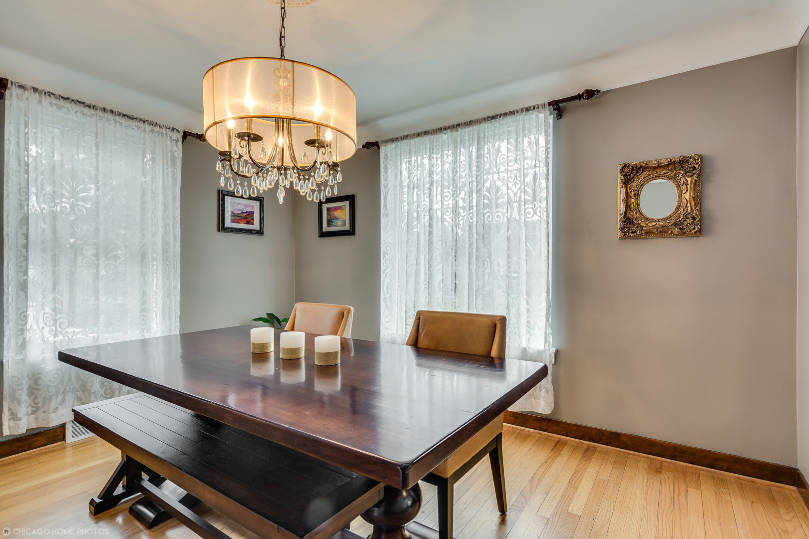 583 Selborne Road Riverside, IL 60546 - Photo 10 of 28 a view of a dining room with furniture and a chandelier