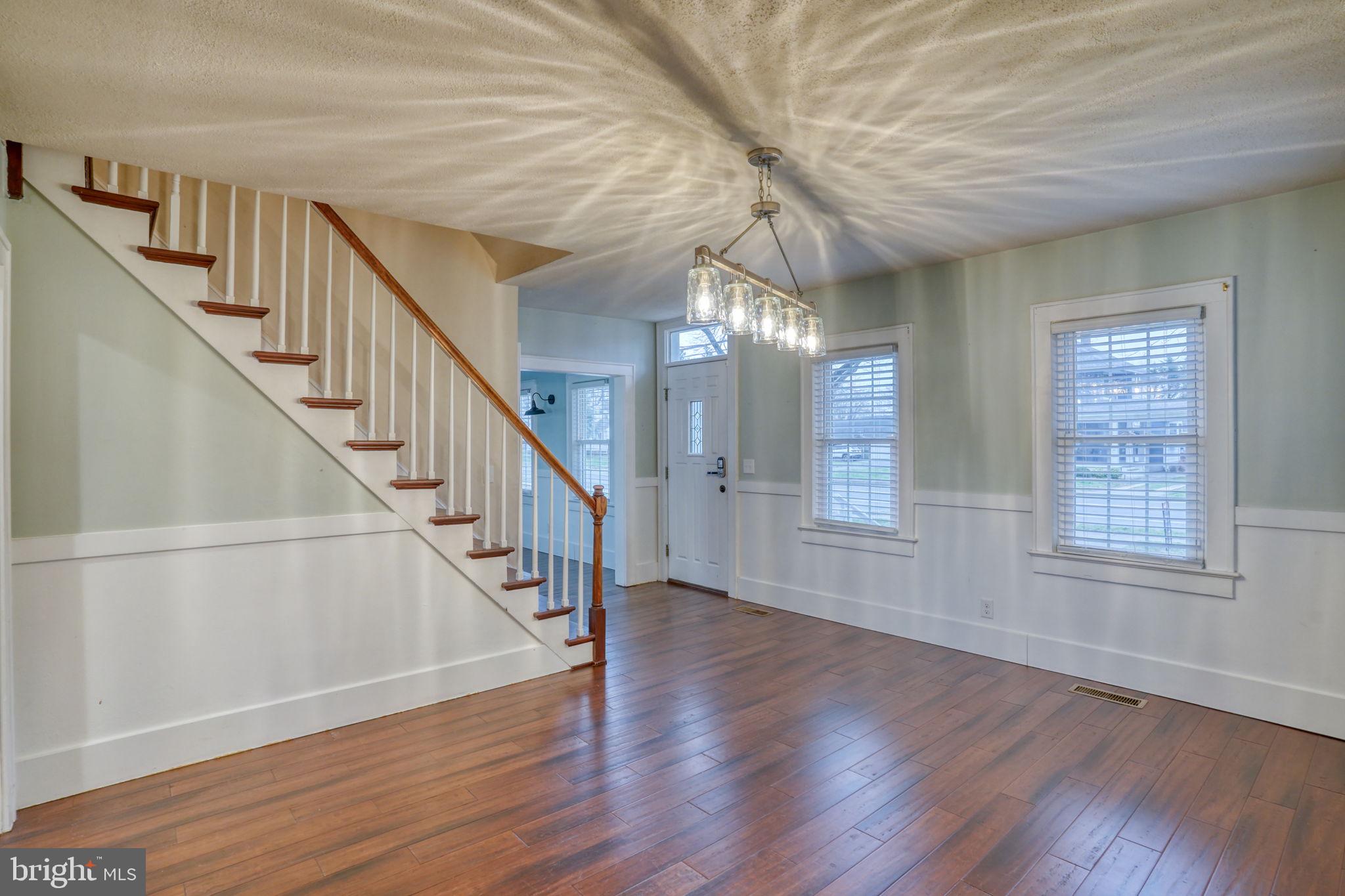 129 Laurel Road Millsboro, DE 19966 - Photo 11 of 40 a view of an entryway with wooden floor