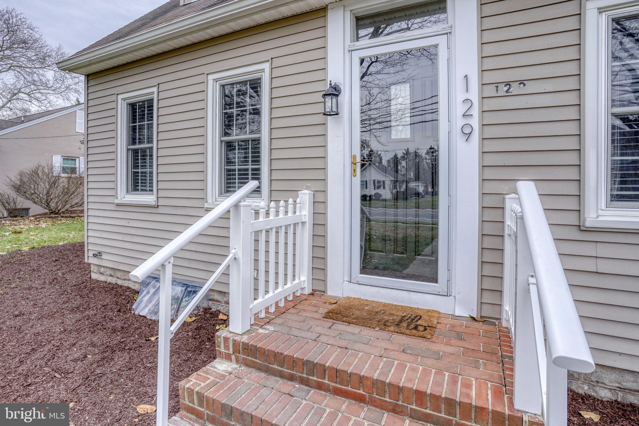 129 Laurel Road Millsboro, DE 19966 - Photo 4 of 40 a view of a house with a door and wooden floor