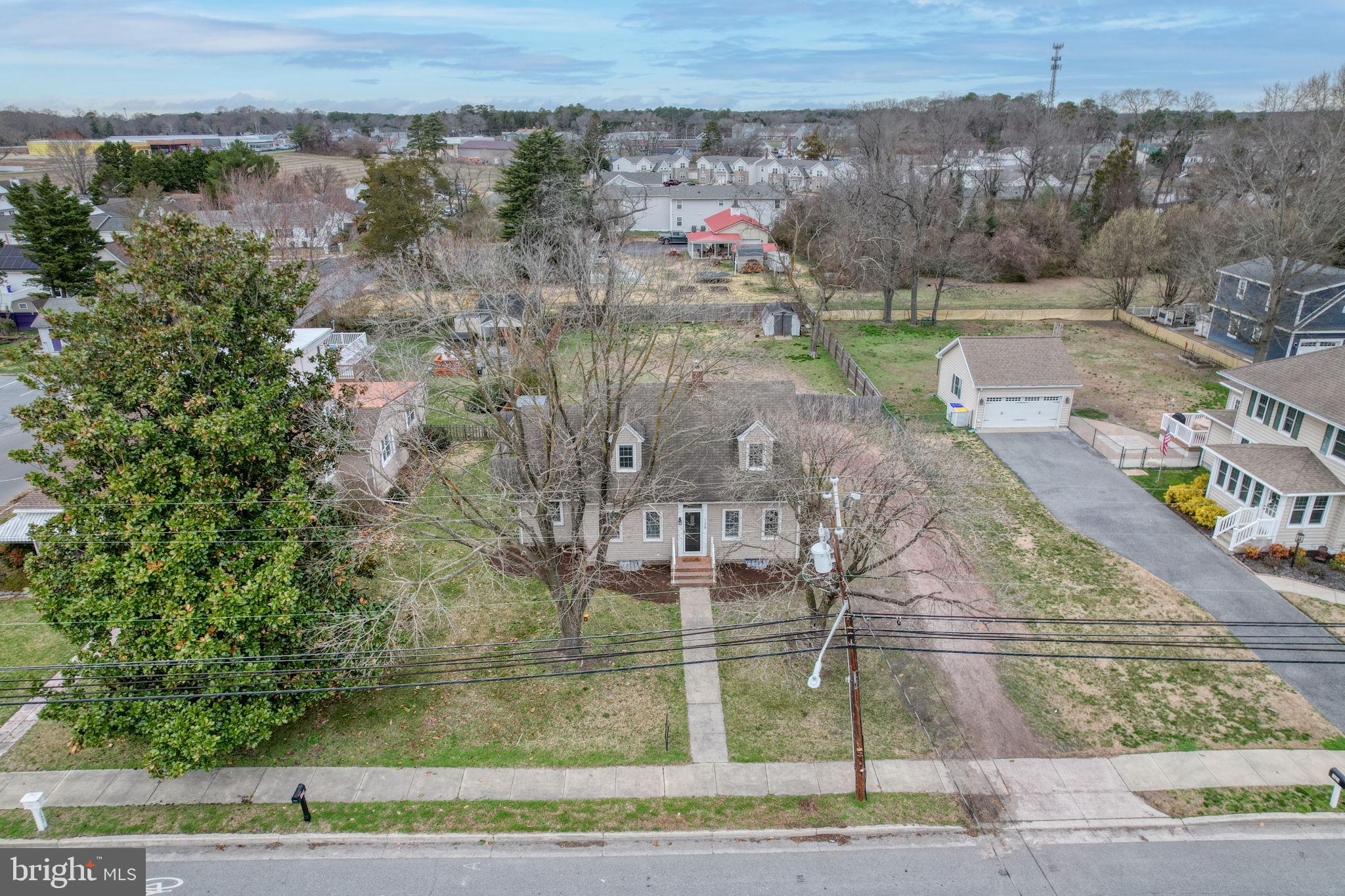 129 Laurel Road Millsboro, DE 19966 - Photo 5 of 40 an aerial view of a houses