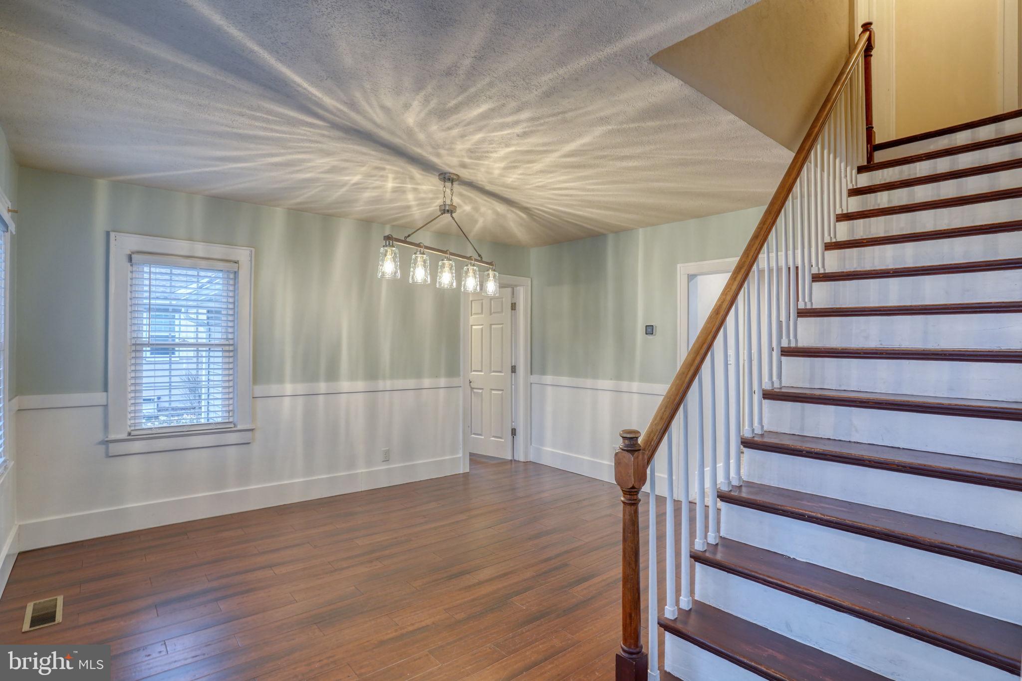 129 Laurel Road Millsboro, DE 19966 - Photo 9 of 40 a view of entryway with wooden floor