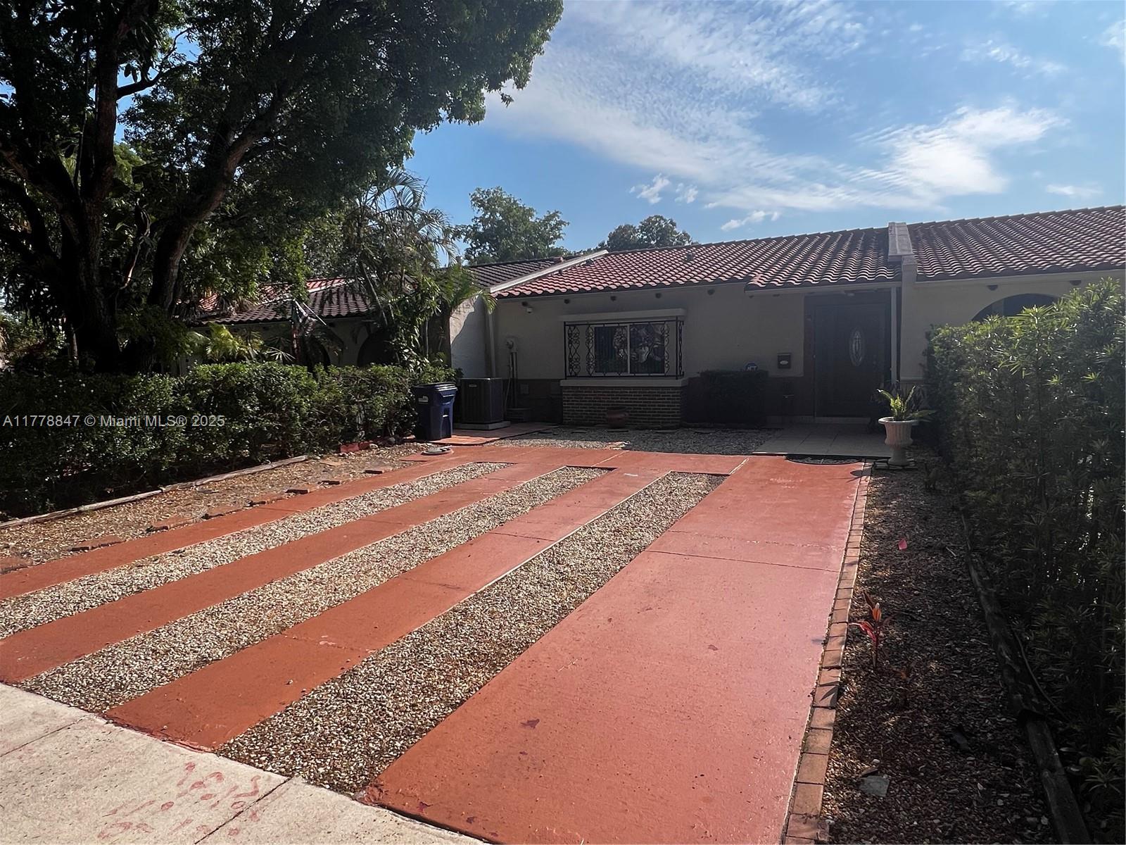 6936 Holly Road Miami Lakes, FL 33014 - Photo 1 of 43 Great Curb Appeal and plenty of parking space.