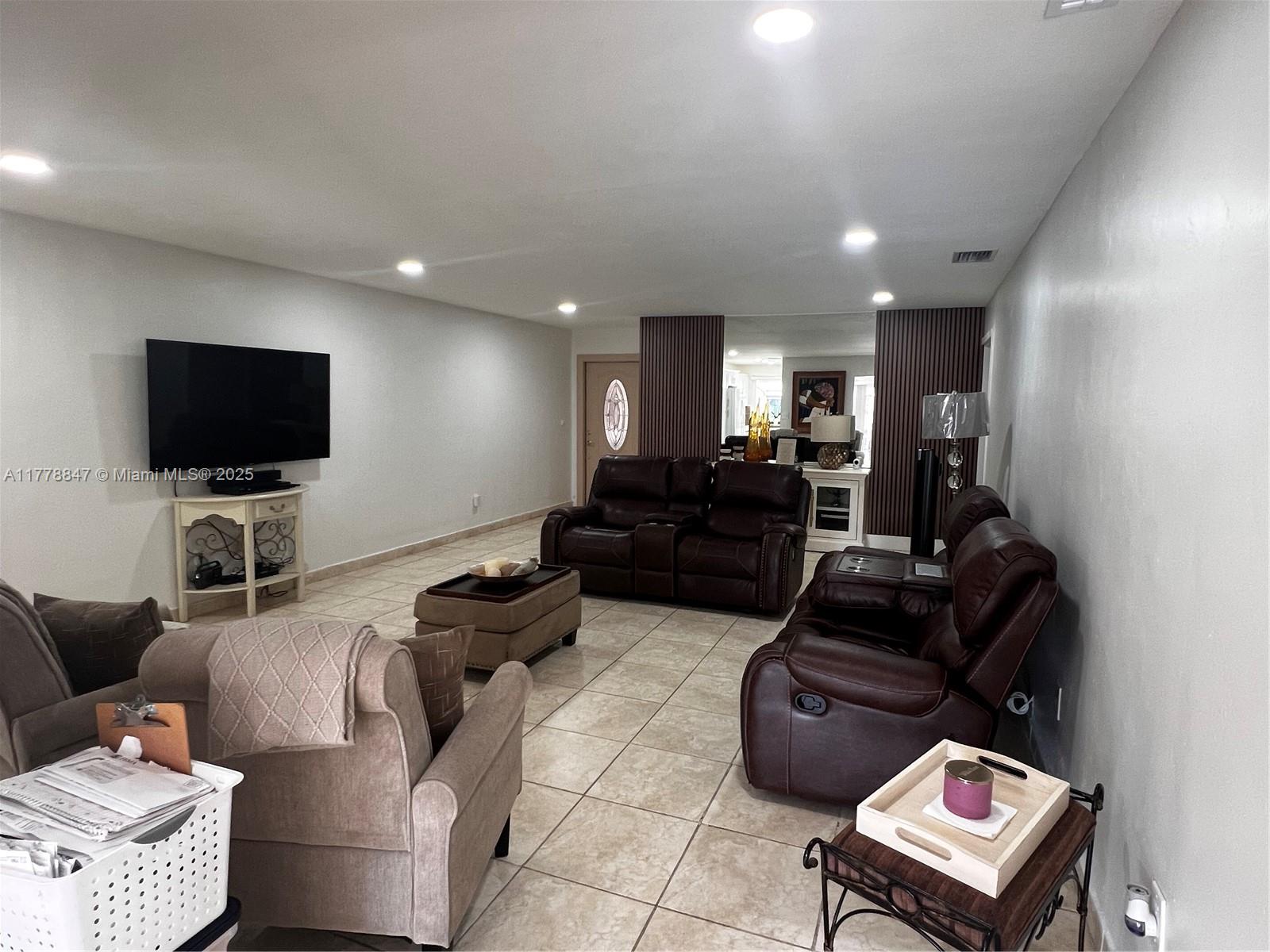 6936 Holly Road Miami Lakes, FL 33014 - Photo 12 of 43 Generous space to entertain.