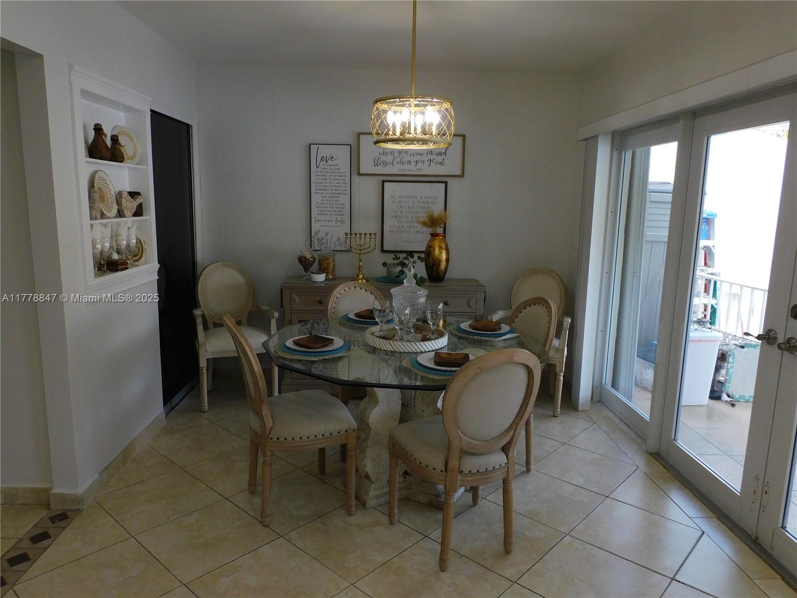6936 Holly Road Miami Lakes, FL 33014 - Photo 20 of 43 Dining area overlooks beautiful Lake Martha.
