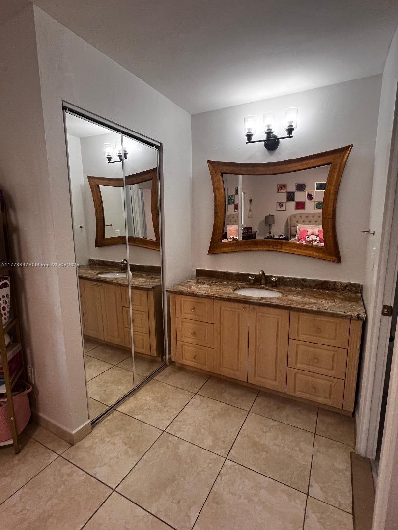 6936 Holly Road Miami Lakes, FL 33014 - Photo 23 of 43 Dressing and vanity ara.