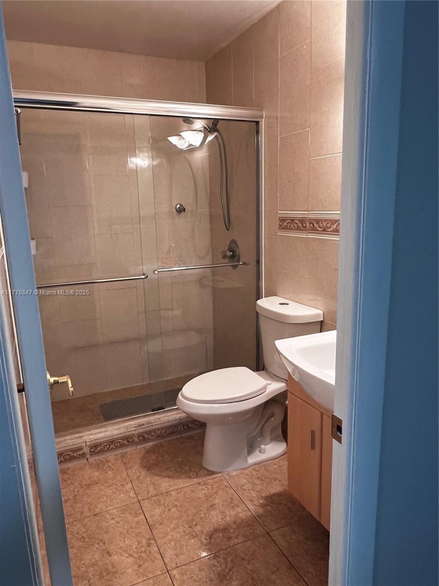 6936 Holly Road Miami Lakes, FL 33014 - Photo 29 of 43 2nd bathroom glass enclosure.