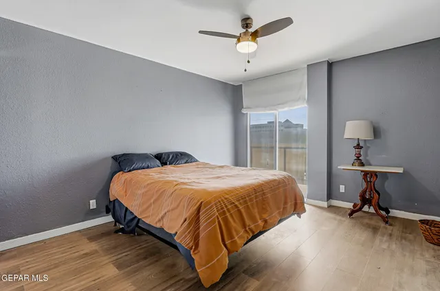 a kitchen with white cabinets and appliances