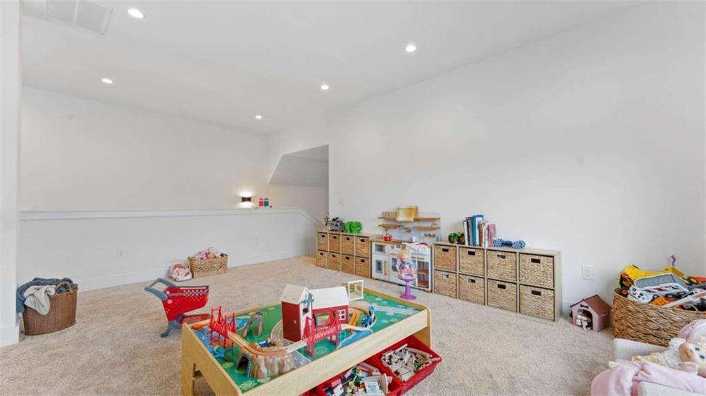 28 Ravenfield Road Taylorsville, GA 30178 - Photo 23 of 38 a living room with lots of furniture and clutter