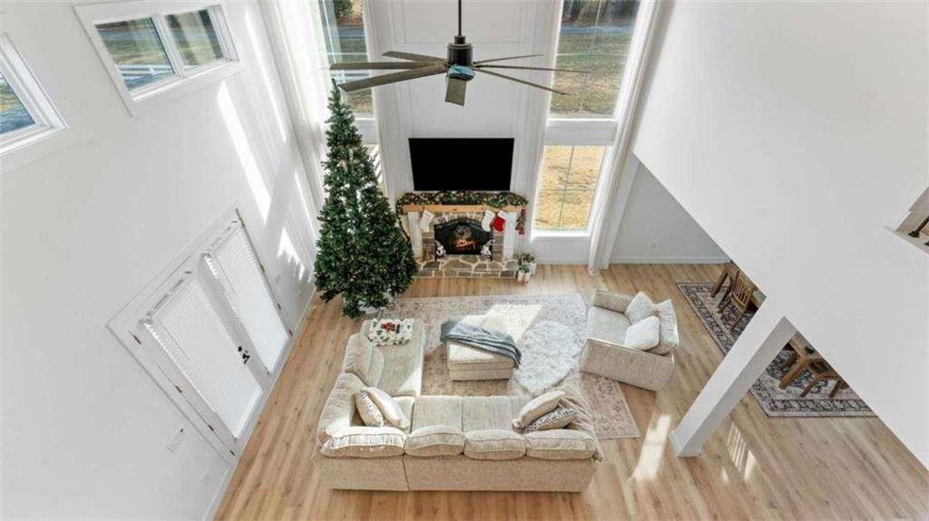 28 Ravenfield Road Taylorsville, GA 30178 - Photo 24 of 38 a view of living room with furniture and a flat screen tv