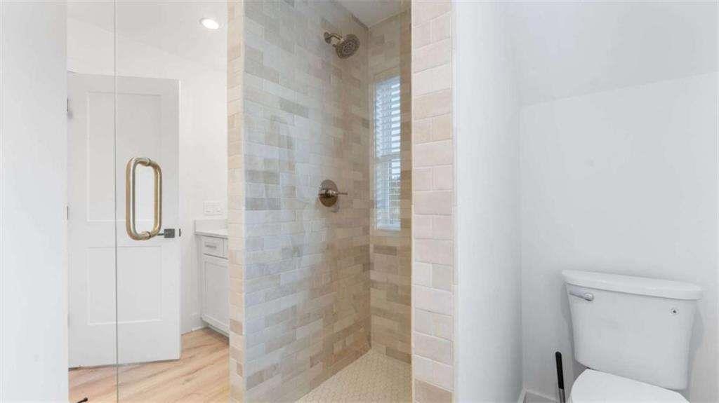 28 Ravenfield Road Taylorsville, GA 30178 - Photo 28 of 38 a bathroom with a shower and toilet