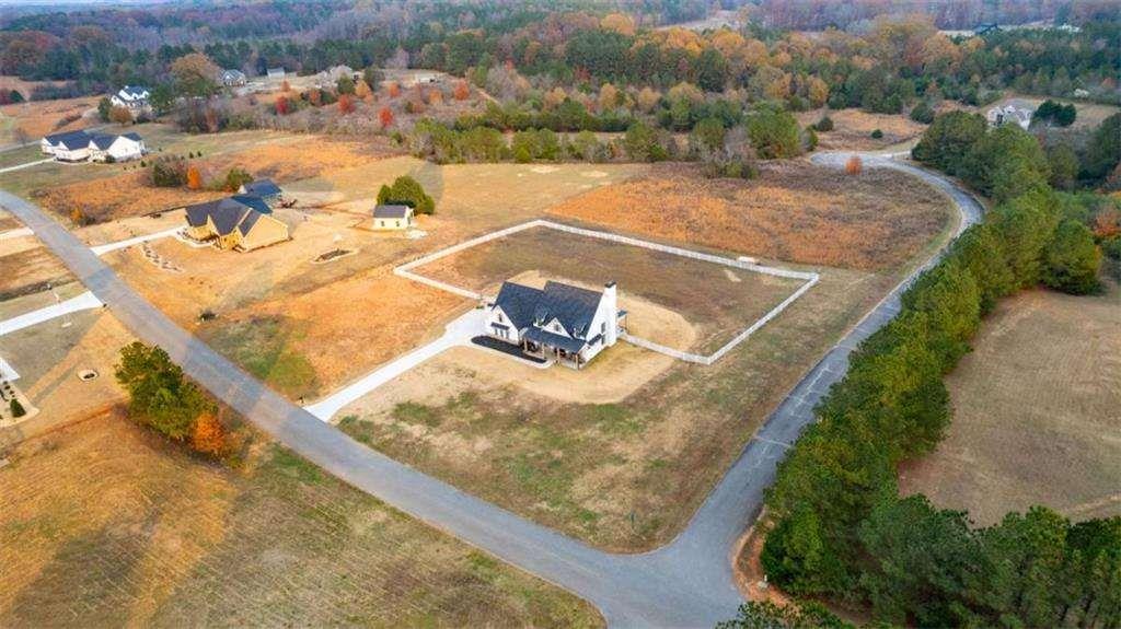 28 Ravenfield Road Taylorsville, GA 30178 - Photo 38 of 38 a view of a swimming pool with a yard