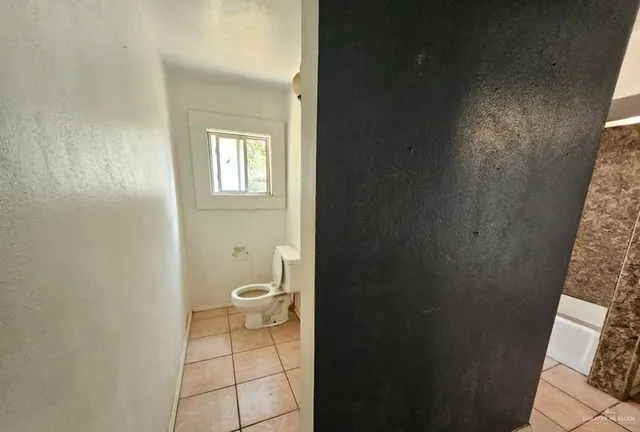 a bathroom with a toilet