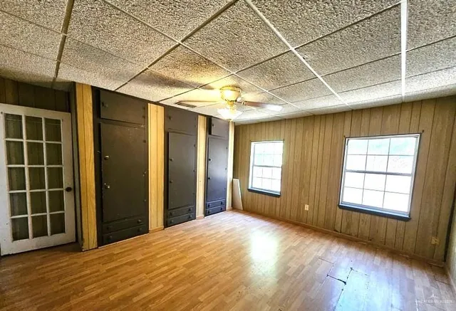 an empty room with windows