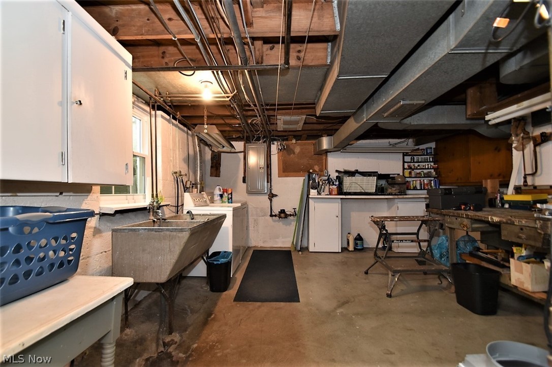 37125 Jackson Road Chagrin Falls, OH 44022 - Photo 23 of 29 Utility side of basement with laundry and work room