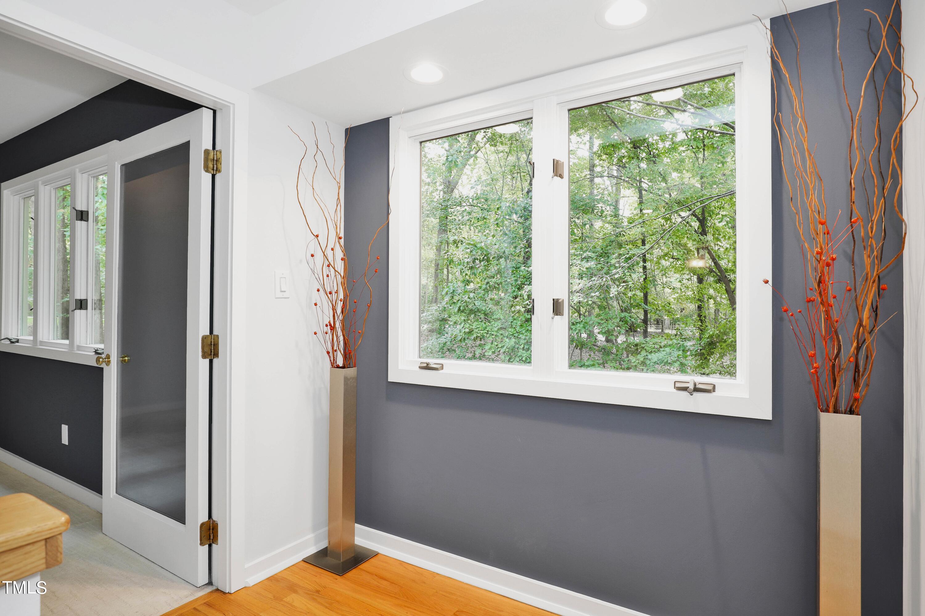 11312 Old Creedmoor Road Raleigh, NC 27613 - Photo 32 of 62 a view of an empty room and window