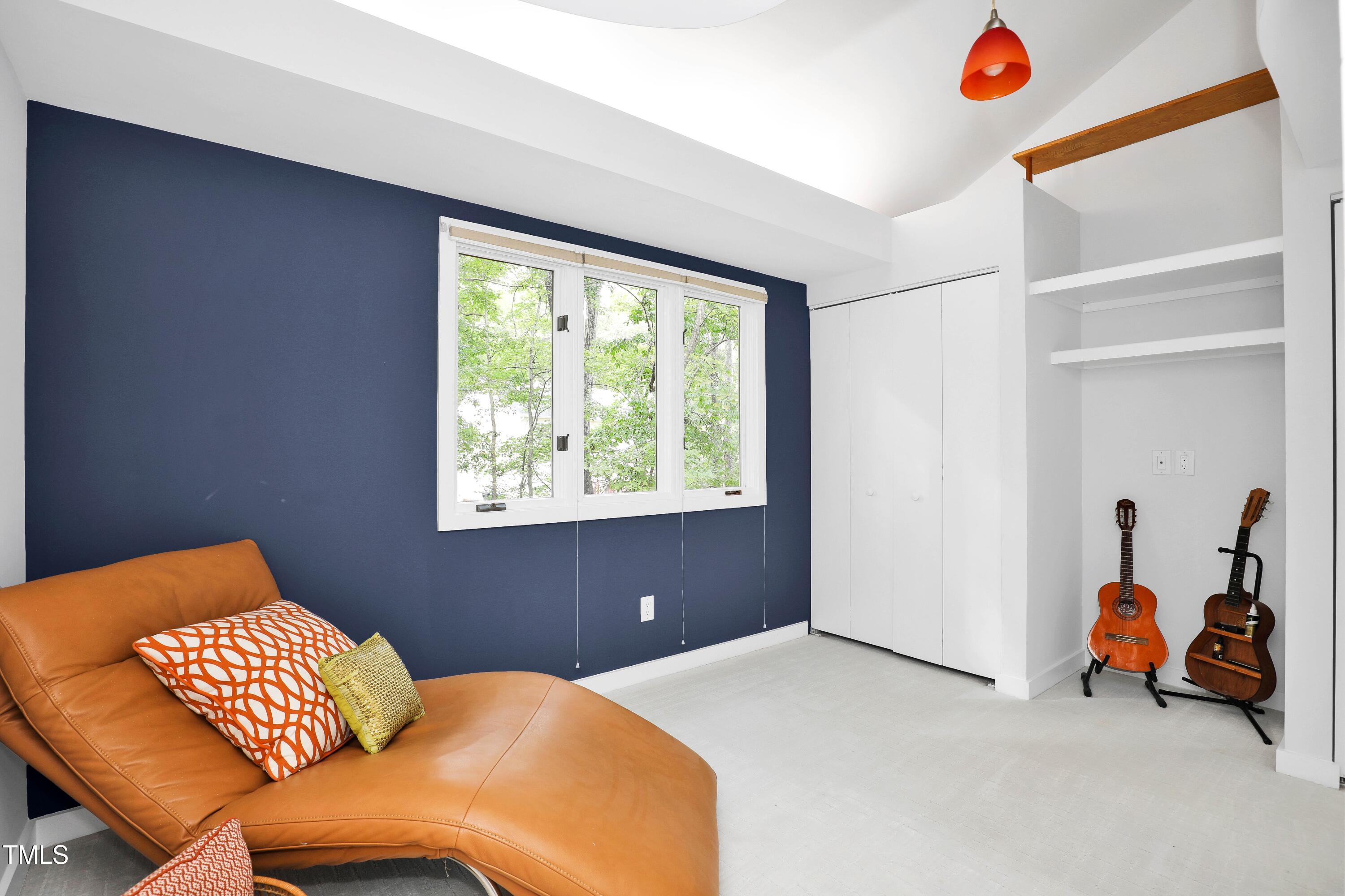 11312 Old Creedmoor Road Raleigh, NC 27613 - Photo 45 of 62 a bedroom with bed and a window