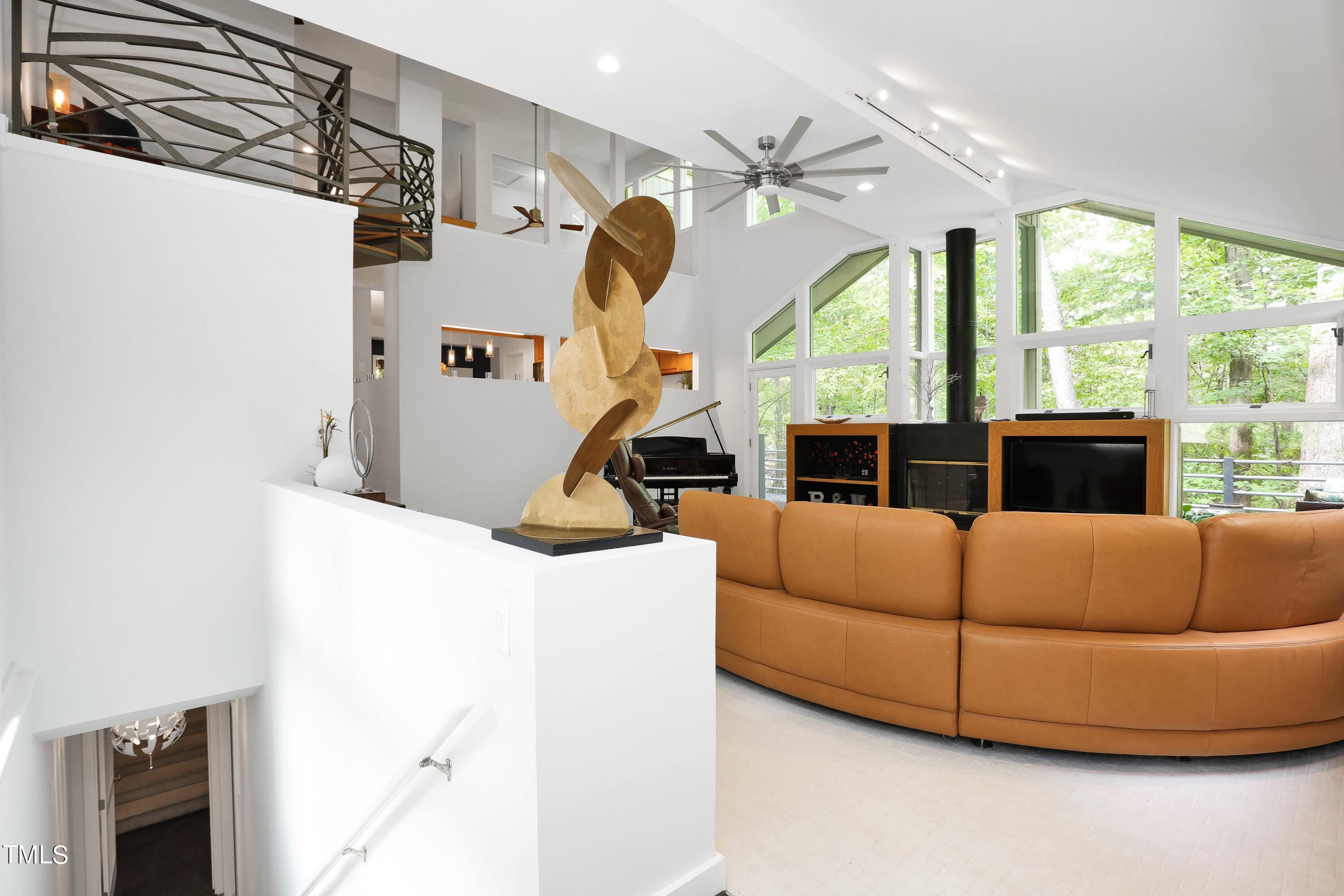 11312 Old Creedmoor Road Raleigh, NC 27613 - Photo 50 of 62 a living room with furniture and a large window